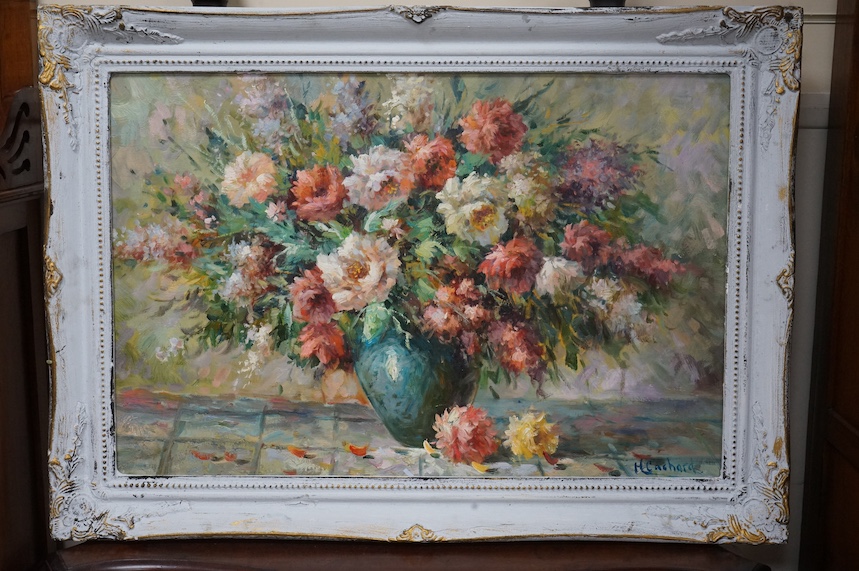 A decorative oil on board, Still life of flowers in a vase, 49 x 74cm. Condition - good